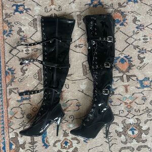 Men’s size 10 Pleaser Heels. Black Patent Leather. Thigh High Boot with buckles.